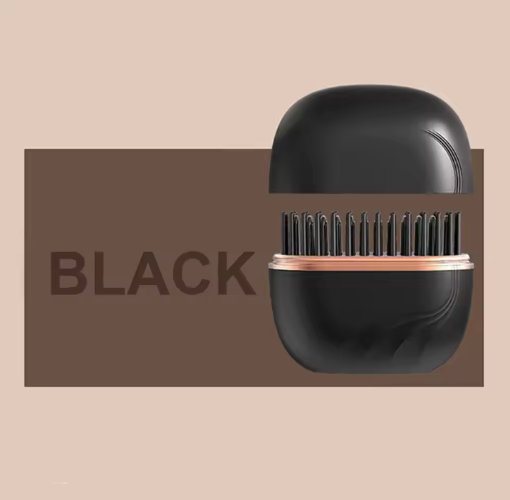 Black hairbrush with rose gold accents on a beige background